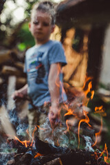 a child by the fire