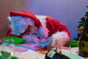 Santa Claus tired after work at christmas eve.