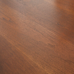 Detail photo of the wood grain on a Mid-Century Modern table