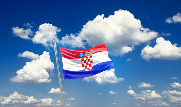 Croatia national flag cloth fabric waving on the sky - Image