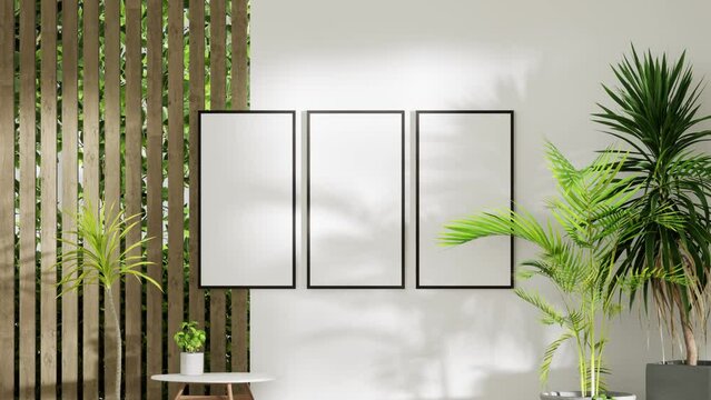 interior mockup three picture frames on wooden wall,minimalism,small table and house tropical plants.
