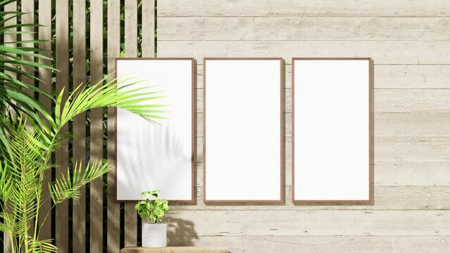 interior mockup three picture frames on wooden wall,minimalism,small table and house tropical plants.
