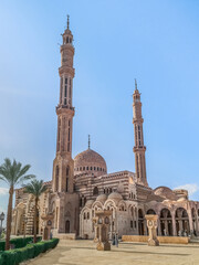 Side view of Al Mustafa Mosque with two minarets in Sharm El Sheikh, Egypt. Beautiful modern egyptian muslim temple