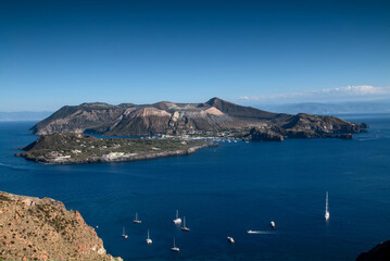 View from observatory viewpoint onto the volcanic island of Vulcano and boats on the sea