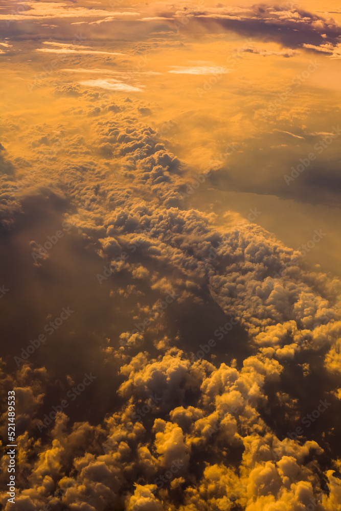 Wall mural sunset clouds background and texture, clouds from airplane window
