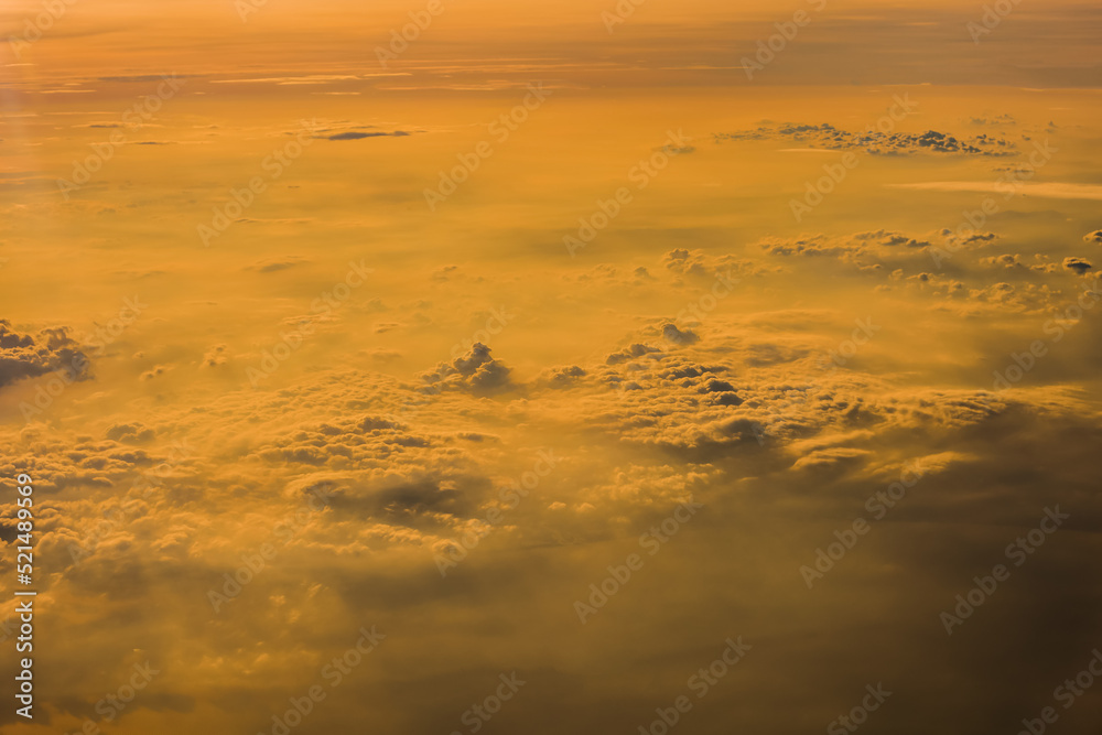 Wall mural sunset clouds background and texture, clouds from airplane window