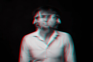 Abstract blurry portrait of a psychopathic man with schizophrenic diseases and split personality. Black and white with 3D glitch virtual reality effect