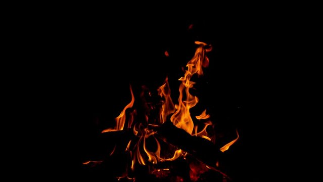 Super Slow Motion of Camp Fire Isolated on Black Background. Filmed on High Speed Cinema Camera.