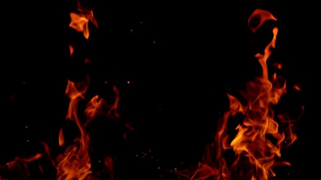 Super Slow Motion of Fire With Sparks Isolated on Black Background. Filmed on High Speed Cinema Camera.
