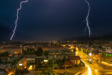 Lightning strikes near the Innsbruck, view above the town, from hotel Tivoli