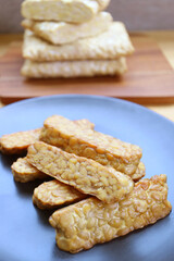 Closeup a plate of delectable roasted Tempeh, a good source of plant-based protein