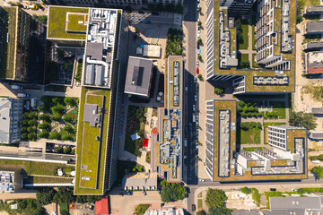 Neomodern green blocks of flats from above. Drone perspective. Green rooftop terraces. Cityscape. . High quality photo