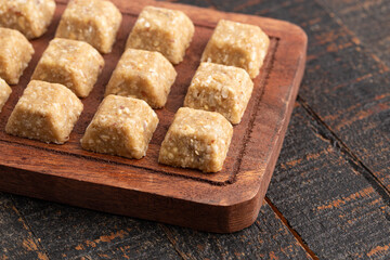 Vanilla and Almond Granola Energy Bites on a Wood Countertop