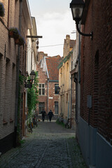 tight narrow street in the old town, ghent, Belgium