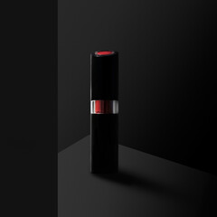 Stick of lipstick on a black background with minimal light.