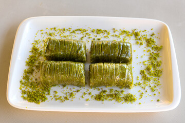 Pistachio baklava. Traditional Middle Eastern Flavors. Traditional Turkish baklava. Local name...