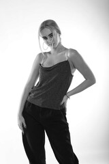 Black and white studio portrait of young lady