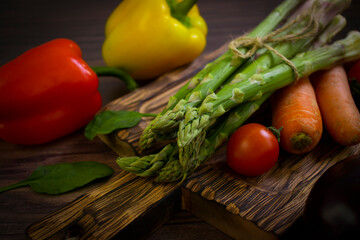 Organic vegetables on wooden background