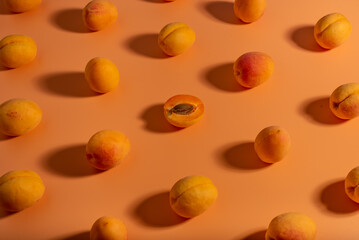 fresh apricot on orange background