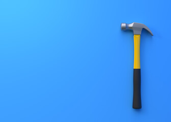 Claw hammer with yellow plastic handle isolated on blue background. Top view, minimalism. Copy space. 3d rendering illustration