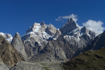 Fototapeta premium Baintha Brakk or 'The Ogre' is a steep, craggy mountain, (7,285 meters) in Panmah Muztagh, a sub range of Karakoram range. It is on the brink of 67 kilometers long Biafo Glacier in Pakistan. 
