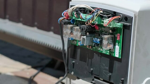 Connecting the automatic garage gate mechanism with remote controller. Installation automatic gate motor and working for control gate home security system