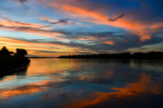 Beautiful sunset on the Guapor&eacute; - Itenez river from the remote village of Versalles, Beni Department, Bolivia, on the border with Rondonia state, Brazil