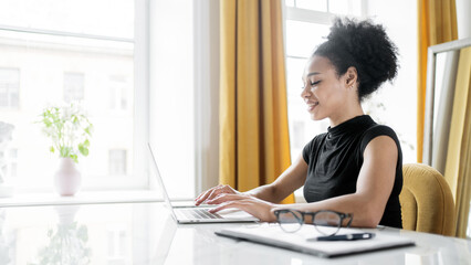 Young female secretary online working in an office in a coworking space