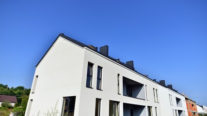 Terraced family home in newly developed housing estate. The real estate market in the suburbs.