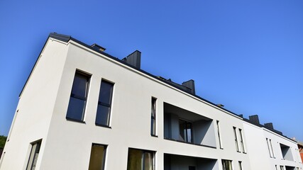 Terraced family home in newly developed housing estate. The real estate market in the suburbs.