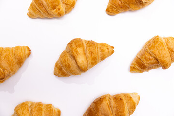 Croissants Patterned On White Surface