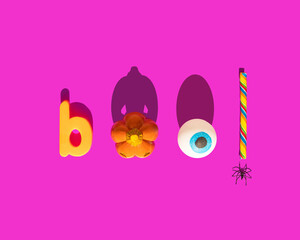 Halloween boo concept. Scary pumpkin, eye ball, candy and spider on pink background. Minimalistic holiday composition.