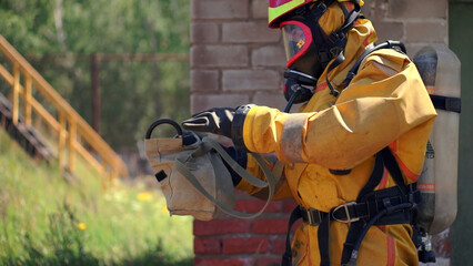 Workflow. Gas mask. Clip. Men in gas masks in the working environment .