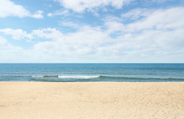 Picturesque view of sandy beach near sea