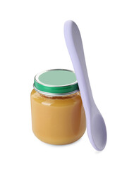 Jar of healthy baby food and spoon on white background