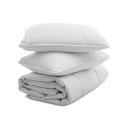 Soft blanket with pillows on white background