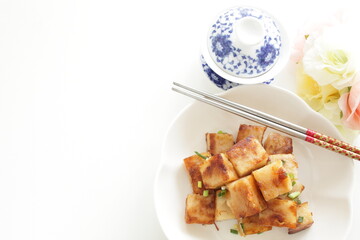 Chinese food, radish cake and XO sauce stir fried with spring onion 