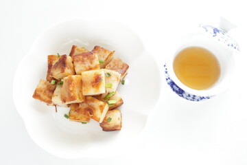 Chinese food, radish cake and XO sauce stir fried with spring onion 