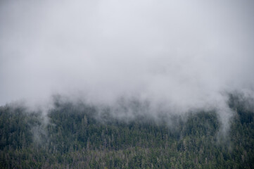 Beautiful views of clouds and mountains along the Alaska coast near Sitka.