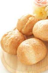 Multiple French bread on wooden board for breakfast image