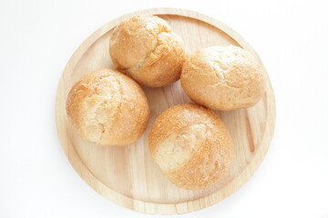 Multiple French bread on wooden board for breakfast image