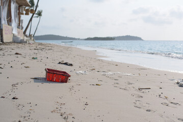 Dirty tropical beach full of plastic garbage. Environmental problem issue.