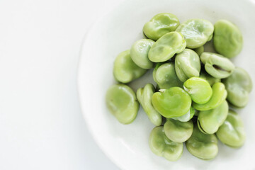 Boiled Japanese broad bean on plate for healthy snack food image