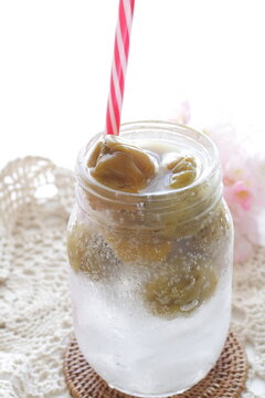 Japanese plum wine soda in jar bottle for cocktail drink image