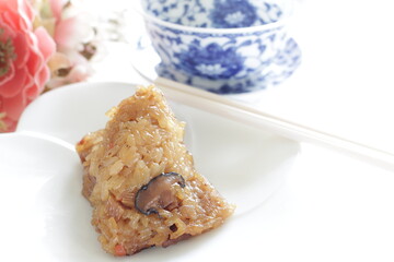 Chinese food, zongzi sticky rice wrapped by leaf for traditional dumpling food image