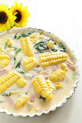 Milk and egg wash with sweet corn and bacon for quiche cooking image 