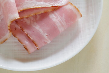 Pan fried bacon on dish for cooking ingredient 