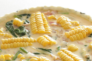 Milk and egg wash with sweet corn and bacon for quiche cooking image 