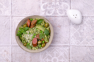 Pasta with vegetables and sausages