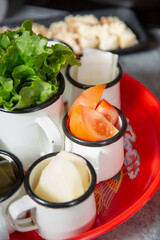 A view of a selection of vegetable sides, seen at a local hot pot restaurant.